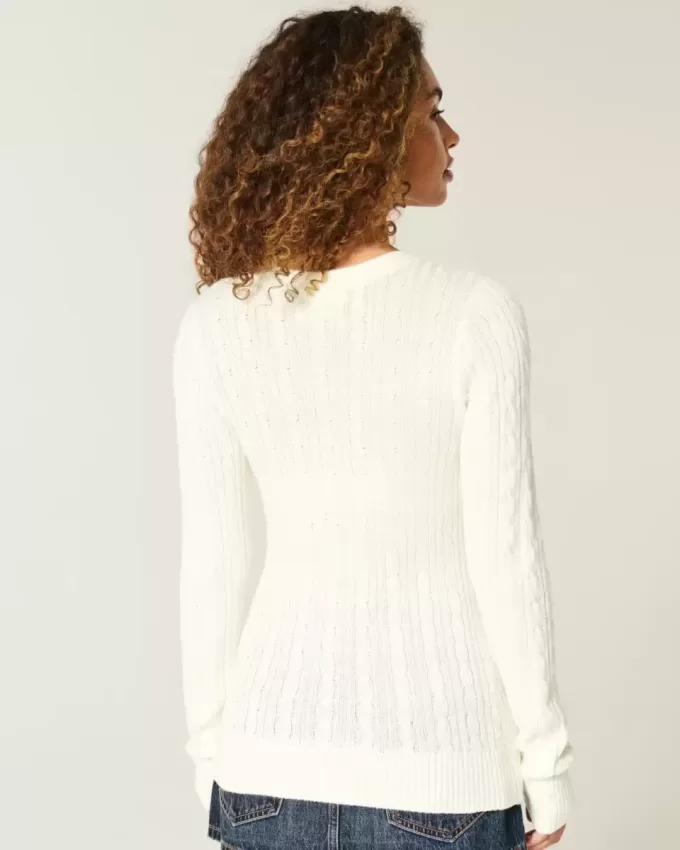 Zopfmuster-Strickpullover mit Sternenmuster und Rundhalsausschnitt Zopfmuster-Strickpullover mit Sternenmuster und Rundhalsausschnitt