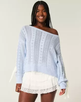 Zopfmusterpullover mit Schleifenärmeln Zopfmusterpullover mit Schleifenärmeln