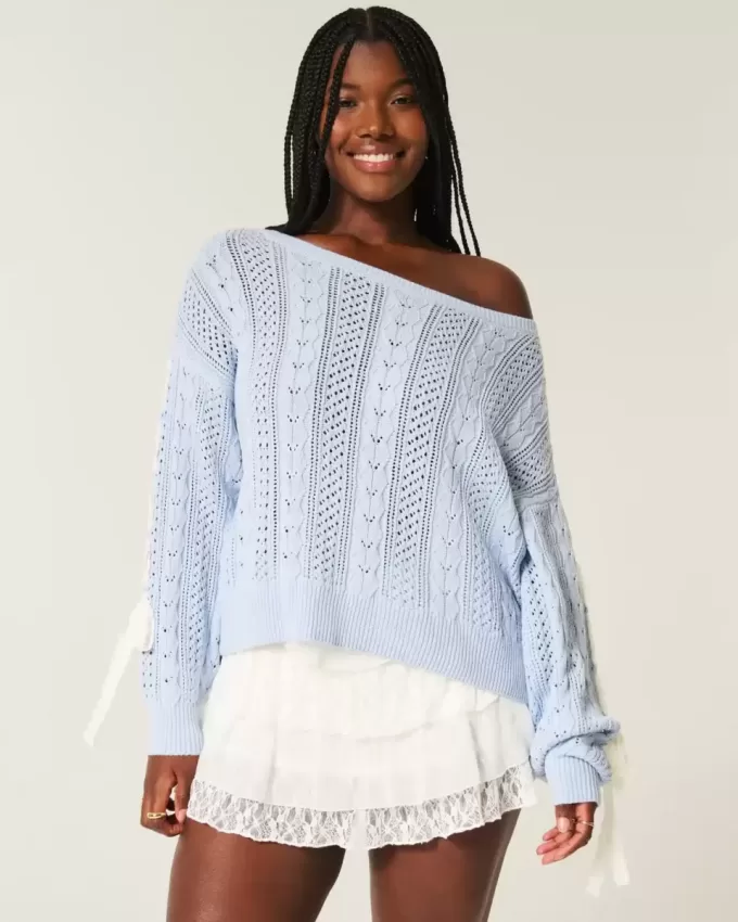 Zopfmusterpullover mit Schleifenärmeln Zopfmusterpullover mit Schleifenärmeln