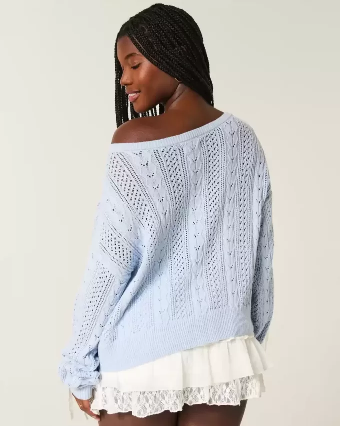Zopfmusterpullover mit Schleifenärmeln Zopfmusterpullover mit Schleifenärmeln