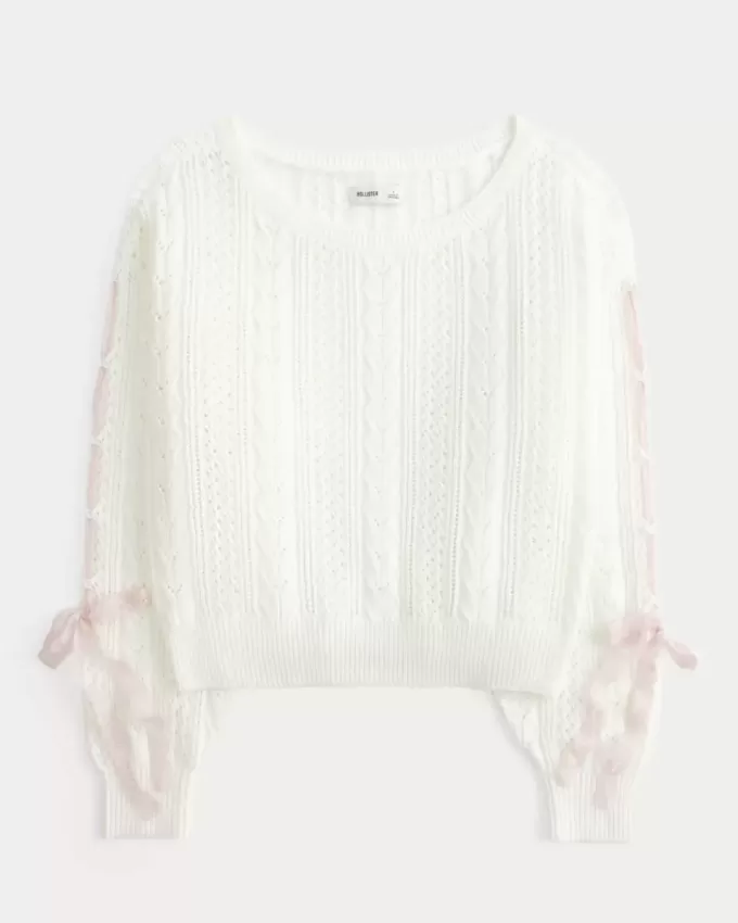 Zopfmusterpullover mit Schleifenärmeln Zopfmusterpullover mit Schleifenärmeln