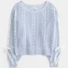 Zopfmusterpullover mit Schleifenärmeln Zopfmusterpullover mit Schleifenärmeln
