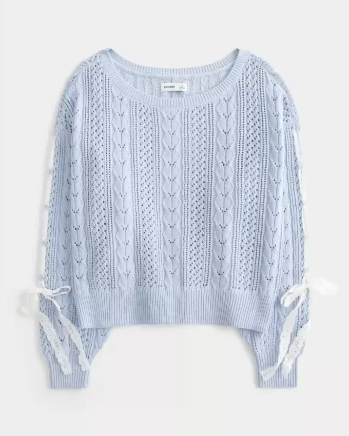 Zopfmusterpullover mit Schleifenärmeln Zopfmusterpullover mit Schleifenärmeln