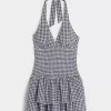 Zweilagiges, gesmoktes Neckholder-Skortkleid Zweilagiges, gesmoktes Neckholder-Skortkleid